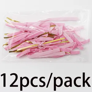 Pink velvet bow twist ties detail view, gold wire craft decoration pack of twelve pieces.