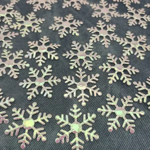 Iridescent snowflake sequins for holiday crafts, DIY decoration and festive details.
