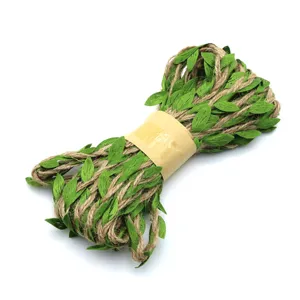 Close-up detail of artificial green leaf vine jute twine ribbon for craft and decor.
