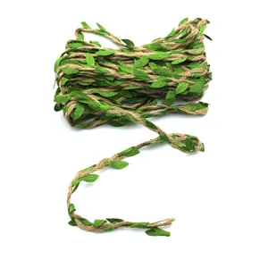 Close-up view of artificial green leaf jute twine roll detail, perfect for crafts and gardening decor.