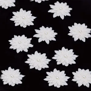 White linen burlap flower appliques with pearl center for DIY sewing crafts and home decor.