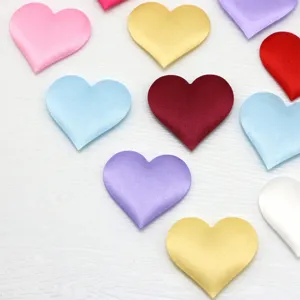 Detailed view of colorful fabric heart petals, perfect for DIY wedding and Valentine decor.