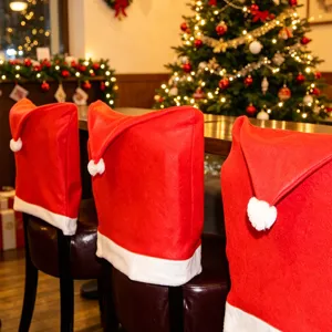 Housses de chaise chapeau de noël tissu rouge housses de chaise de salle à manger festives.