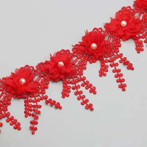 Close up of red lace trim with floral applique and pearl for wedding decoration crafts 9cm