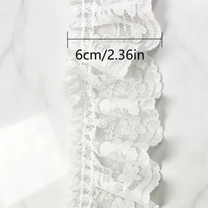 White pleated lace trim detail shot showing 6cm width for DIY sewing and dressmaking.
