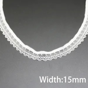 White elastic lace trim detail shot displaying fine floral pattern and 15mm width specs.