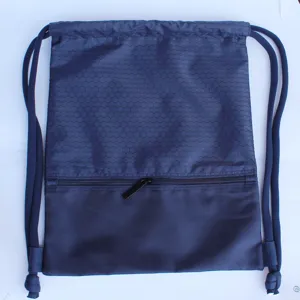 Dark blue nylon drawstring backpack detail, honeycomb pattern pocket sport gym cinch bag travel