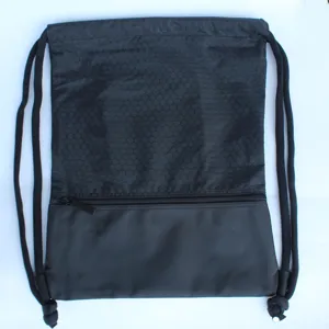 Black nylon drawstring backpack detail showing honeycomb pattern, zipper pocket and thick cords.
