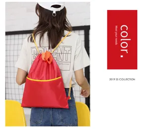 Red oxford cloth drawstring backpack lightweight casual sport gym bag for daily travel.