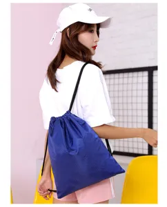 Waterproof drawstring backpack sports gym bag for men and women large capacity travel.