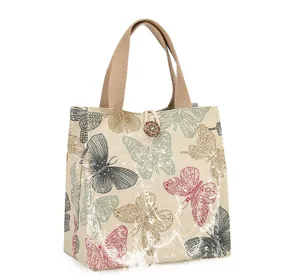 Canvas lunch bag with retro butterfly print and portable handles for daily work and meal prep.