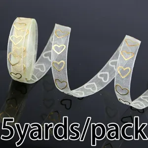 Valentine sheer organza ribbon with gold hearts for gift wrapping, wedding and party decor.