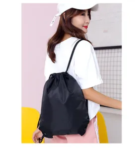 Black nylon drawstring backpack for sports, fitness and outdoor activities with durable cloth.