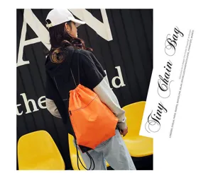 Lightweight nylon drawstring backpack detail, solid color casual sports gym travel bag double shoulder.