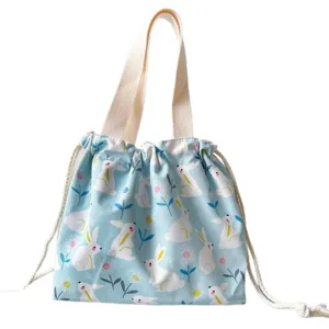 Cute Japanese cartoon rabbit print canvas drawstring lunch bag portable bento handbag for students.