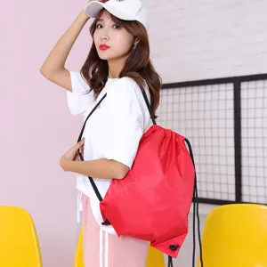 Red waterproof drawstring backpack, lightweight gym sack for outdoor travel and sports.