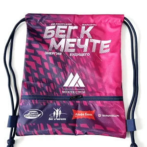 Detailed view of the printed drawstring backpack featuring secure zipper front pocket design.