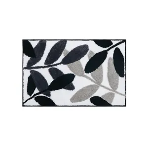 Tapis de bain tufté moderne avec motif de feuilles noires et grises, antidérapant absorbant.