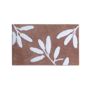 Tapis de bain tufté avec motif de feuilles marron et blanc, tapis de sol absorbant antidérapant.