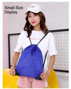 Blue drawstring backpack for outdoor travel, lightweight storage bag with durable shoulder straps.