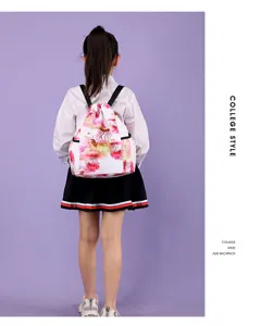 Sac à dos étanche pour enfants en toile avec motif floral idéal pour l'école et les voyages.