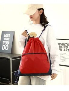 Lightweight waterproof drawstring backpack for gym sports travel in red and blue