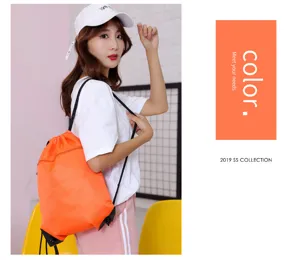 Casual orange drawstring backpack for daily outdoor use, lightweight and portable sports bag.