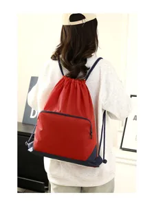Lightweight drawstring backpack with front zipper pocket, durable waterproof gym sports bag.