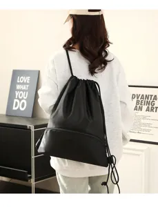 Black waterproof nylon drawstring backpack detail, ideal for sports and casual daily use.