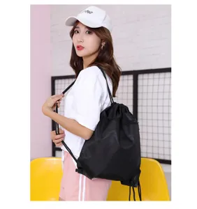 Black drawstring backpack lightweight casual sports gym sack pack for daily outdoor use.