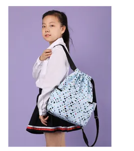Sac a dos impermeable bleu clair imprime de cartoons pour ecoliers voyage quotidien.