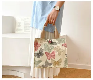Canvas lunch tote bag with vintage colorful butterfly print, casual handbag for daily use.