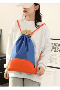 Waterproof drawstring backpack in blue and orange, ideal for sports, gym, and travel use.