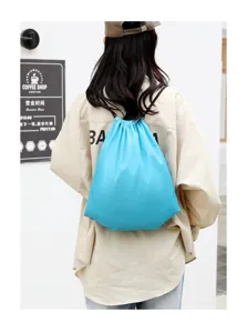 Bright blue drawstring backpack for daily sports, lightweight polyester storage bags.