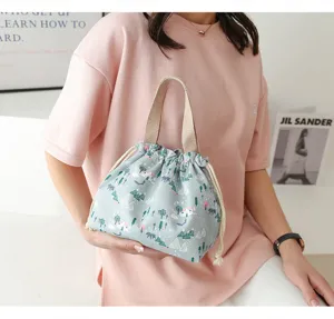 Canvas lunch bag with drawstring closure, cute forest print design for daily use.