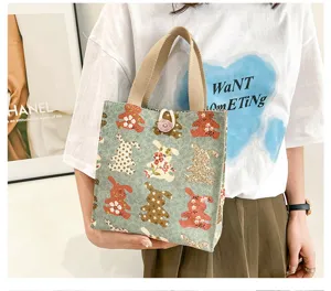 Japanese style canvas handbag detail, cute animal pattern print, daily portable lunch bag.