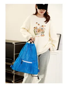 Blue mesh drawstring backpack, breathable sports beach bag with zipper front pocket for swim.