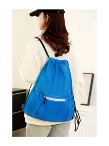 Blue mesh drawstring backpack detail view, breathable gym sports beach storage bag for outdoor.