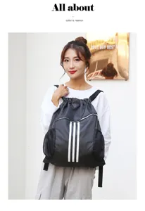 Black drawstring backpack for sports and gym, large capacity casual training gym bag with stripes.