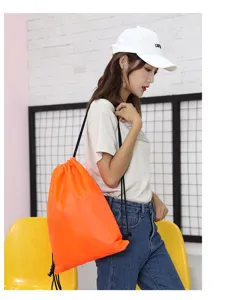 210D polyester drawstring backpack in bright orange, ideal for sports, travel, and student use.