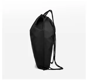 Black polyester drawstring backpack detail shot, lightweight cinch bag for daily gym use.