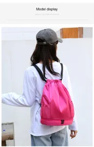 Waterproof pink gym drawstring backpack with dry wet separation and side mesh pockets detail