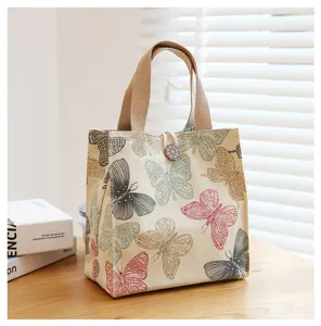 Canvas lunch bag with cute butterfly print, large capacity portable bento tote for work.