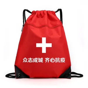 Red emergency drawstring backpack, portable outdoor storage bag with white cross and slogan.