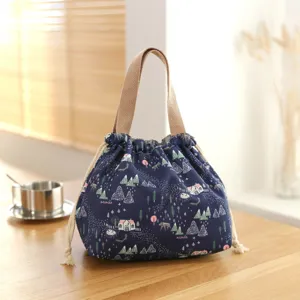 Japanese style bento lunch bag with drawstring closure, waterproof fabric, forest pattern.