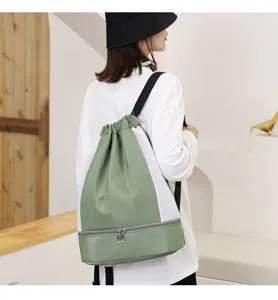 Sac a dos de sport impermeable avec compartiment a chaussures pour fitness et natation.