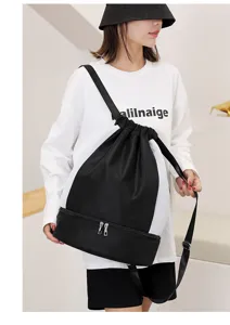 Sac à dos de sport étanche avec cordon et compartiment chaussures séparé, noir et blanc.