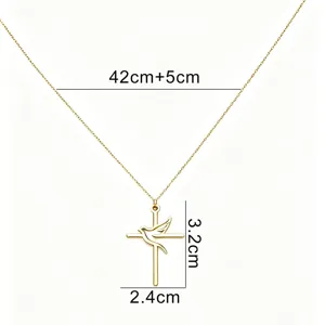 Detail view of gold stainless steel dove cross necklace with size measurements