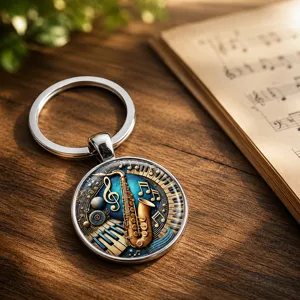 Close-up of a vintage musical keychain with saxophone and piano motifs on a wooden table.