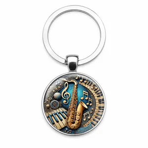 Detailed view of retro musical glass keychain with saxophone and piano key design